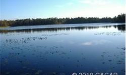 REDUCED!! LAKE ELIZABETH, 3.19 ACRE LOT. BEAUTIFUL LAKE ELIZABETH. "GO GREEN" (NO OUTBOARD MOTORS) on this ECO-FRIENDLY private lake. Here you can enjoy a beautiful setting on 3.19 acres with 105 ft of lakefront. Property has many varieties of plant and