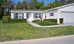 Palm Harbor Home on an Estate lot with 3 bedrooms and 2 baths in a split plan. Has 5/8 drywall through-out home. Spacious living room and dining area. Kitchen features upgraded appliances, island, refrigerator with freezer on bottom. Bar separating living