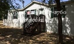 A gorgeous 4 bed 2 Bath Used Double Wide Home on .72 acres of land. With 1,512 square feet (27 x 56) and many features this home is perfect for both new and experienced home buyers. The home is in a great corner lot location, just minutes from town. It is