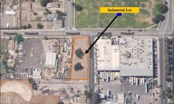 Approx. 19,099 sq.ft of vacant industrial land. Zoning is IL (Industrial) with building plans for a 5,000 sq.ft warehouse.Congress and 7th Street.