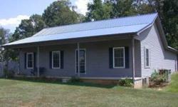 MUST SELL! BRING ALL OFFERS! Property is rural development eligible for little or no down payment! Beautiful setting for this cute country cottage!Bring the rocking chairs and enjoy the rain under the metal roof on your 42 covered front porch!Situated on