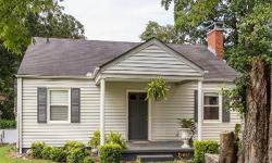Character and warmth! A covered front porch welcomes you into this charming home offering lots of hardwoods and crown molding throughout. The inviting family room is enhanced by a wood-burning fireplace, and the remodeled kitchen provides abundant counter