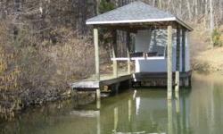 Waterfront lot with COVERED BOAT DOCK IS ready for your dream home. Located in Upscale Crown Point and convenient to all of the amenities of Westlake. Mature hardwoods. Rare opportunity to own a lot with dock in place at this price.Listing originally