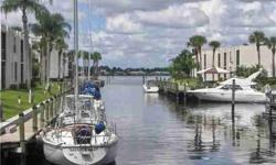 GORGEOUS VIEWS OF A BEAUTIFUL MARINA/ BOAT BASIN THAT LEADS OUT TO PICTURESQUE VIEWS OF THE WIDE RIVER FROM THIS WONDERFUL 2/2 CONDO IN A FABULOUS RIVERFRONT BOATING COMMUNITY. SPANISH TILE THROUGHOUT AND NEWER APPLIANCES. COME ENJOY THE VIEW AND BRING
