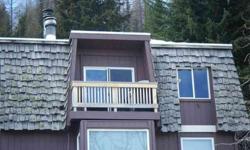 A great deal on a nice totally remodeled top floor, 2 bedroom 1 bath condo. at Schweitzer. The ameneties in this open floor plan include,one car garage, washer/dryer, fireplace, deck, BBQ, ski closet/storage area, built-in bench seat, stainless appliances