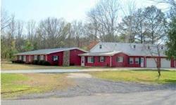 Remodeled, Solid Brick Rancher on large corner lot between Albertville and Guntersville on Mount Olive Road with a private country setting but only minutes from Walmart/Lowes area! Versatile and open floor plan with oversized, sunny rooms. Plenty of