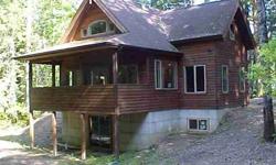 Hood Canal area home near Lake Cushman. Nestled on a beautiful 5.35 acre wooded tract. Owner has just completed the first time owner occupancy permit; making this never lived in 2007 home as close to new as you can get. New appliances, high vaulted