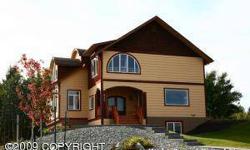 Amazing views of Chugach and Talkeetna Mountains, Turnagain Arm and downtown Anchorage from every room of this elegant, custom built home on a quiet cul de sac. Large entry foyer, huge open kitchen, formal living and dining rooms, family room, high-tech
