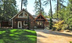Ultimate Luxury in the Pines! Amazing and exquisite luxury home on a breathtaking landscaped parcel surrounded by waterfalls and the tall pines. Walnut wood floors throughout, Cherry spiral stair case, and gourmet kitchen with Thermadore appliances,
