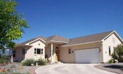 Lovely golf course home on 4th Fairway at beautiful Deer Creek Village Golf Course (Cedaredge Golf Course). Enjoy the views of the Grand Mesa from the spacious deck. Low maintenance landscaping features desert plants and buffalo grass, small fenced garden