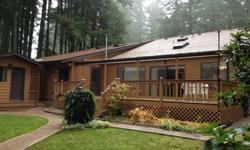 Perfect Island Getaway! Over 1500sq ft of living space features 3 BR, 2.25 BA; Vaulted Knotty Pine Ceilings, master Suite w/Sitting Area, Spacious Kitchen, abundant storage, 2 car garage & Workshop, detached home office & storage shed, Hot Tub Gazebo,