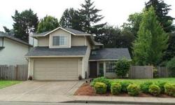 Spacious, bright living room with built-ins flows into dedicated dining area area in 1 direction or cozy family room with fireplace in other direction. WestOne Properties Group is showing 15200 SW Wert Court in Sherwood, OR which has 3 bedrooms / 2.5