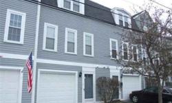Fabulous opportunity to own this bright and airy three level townhouse in Adams Village. Open Living Room and Dining Room with hardwood floors. Updated kitchen with stainless steel appliances and granite countertops. Master bedroom with walk-in
