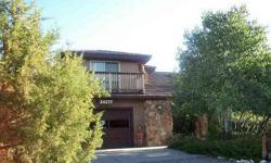 SELLER WILLING TO TRADE FOR COMPARABLE PROPERTY IN GRAND JUNCTION! Enjoy beautiful views from the upstairs decks or seclusion downstairs provided by the mature trees surrounding this aluminum sided low maintenance home. Main floor features grand entry,