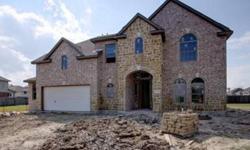 The Barcelona - Elevation B dressed in beautiful brick & Stone! Grand entry w/8ft Entry Door leads to an Impressive 18ft Rotunda Foyer, Open Wrought Iron Staircase! Tile Floors! Oil Rubbed Bronze Lighting/Fixtures, Chefs dream gourmet kitchen w/Avalon