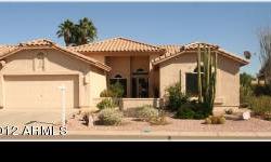 Beautiful location! Wonderful lg Desert Holly with 3 bedrooms! This highly sought after fl. plan will delight the senses! Staggered tile floors t/o except the 2bedrooms! Kitchen features beautiful slab granite with crushed granite sink! Raised oak
