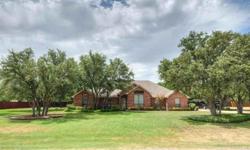 Perfect for Entertaining Indoor or Out. Large Kitchen,island,double oven with convection. Large decking around pool and outdoor grill. Granite countertops in kitchen and master bath. Wood flooring in dining and living, ceramic tile in kitchen, travertine