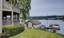 What a rare and wonderful opportunity to start your summer on 70 of prime Mercer Island waterfront! With over 4,180 square feet, this 2-story with basement home has room for everyone and every possibility. A gracious hardwood entry calls you inside and