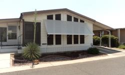 1984 24x64 mobile home for sale. Screened in AZ room, hardwood floors and shed.
