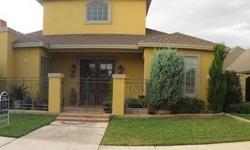 Beautiful garden home in Tivoli Estates w/formal dining area, office, open kitchen to family room, island in kitchen. Wonderful craftsmanship throughout with high ceilings & wood floors, travertine tile & granite countertops.Listing originally posted at