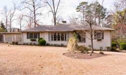 Welcome to this charming 1 level painted brick home located on a quite street in Vestavia. This property boast a 1+ acre flat lot that gives you lots of room to play, entertain or make an addition. Step onto the front porch and into the foyer that leads