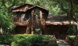 Artist's haven! One-of-a-kind 3 bdrm on 3 levels + separate 1 bdrm, 1 1/2 bath guest cottage. Heavily wooded, backs to creek. Multiple patio areas & decks. Granite, hardwoods, sub-zero & more! Almost 3/4 acre, approx 1 mile to historic downtown Grapevine