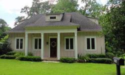 Home totally renovated in 2003 and beautiful craftsman design in Fruit and Nut section of Fairhope. Australian Cypress hardwood floors on main floor, 10' ceilings, antique stained cabinetry with granite countertops and center island. 2 bedrooms and bath