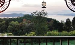 FOR SALE BY OWNER. Reduced $20,000. Fabulous view of the DOUGLAS LAKE and SMOKY MOUNTAINS from every room of this 3275 sq. ft. CEDAR HOME with STONE ACCENTS. Walk out onto the Full Length DECK and enjoy the LORD'S ARTWORK at it's best.BRAND NEW ROOF,
