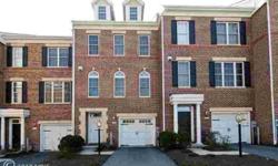 Spectacular brick-front TH close to Towson offer sleek hrdwd flrs & expansive living spaces throughout! DR w/accent molding opens to LR w/gas FP & built-in bookcases. KIT w/granite counters, SS appls & brkfst area w/walkout to deck. Kit lvl laundry. MBR