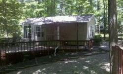 Like New !! Excellent Condition!!Owner will consider all trades! 2005 Top of the line Breckenridge Park Model in Quiet wooded setting close to surrounding state parks and minutes from Brookville Lake. This lot is larger than normal with a creek running