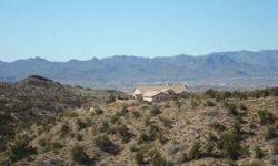 This home site is one of the most breath taking sites in kingman, surrounded by canyons on three sides and a great view looking down on the city of kingman and the hualapai mountains to the south.
