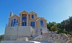 One of a Kind Custom Home with Incredible Views!!! Unique split level floor plan with high celings and lots of windows. Enter large 3 car garage off private rear street with cul-de-sac. Entertaining home with deck. Gated community near the Canyon Springs