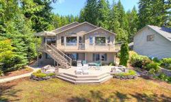 The entertainment possibilities are endless! Enjoy the 60? of no bank waterfront & 180 degree view of picturesque Mason Lake from all three levels of this one of a kind home. Maple hardwood floors, large kitchen, vaulted ceilings, main floor master w/ 5