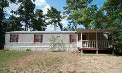 Great home in Atlanta, TX. Country living, but five minutes from Wal-mart. This house features beautiful rolling landscape overflowing with wildlife. Enjoy your front covered deck as you look out on your property. The house has all new flooring, paint,