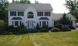 Total Cream Puff, Center Hall Colonial. Master Bedroom with Large Walk In Closet and Spacious Bathroom with Jacuzzi Tub and Separate Shower, Three other Large Bedrooms. Kitchen with Island Cook Top and Double Oven, Dishwasher & Microwave and Spacious
