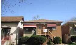 Great Opportunity. Spacious Brick 2 Units located in Stone Park. This lovely house features