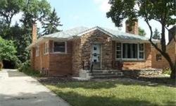 Just what you've been looking for,spacious brick ranch, in move-in condition.Newly finished hdwd flrs & paint throughout,both bathrms re-done.Living rm combined w/ dining area plus eat-in kitchen. Not 1 but 2 fireplaces (liv rm & basement.)Hallway