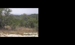 Feel like you're on top of the world! Amazing hill country home site tucked away at back of subdivision offers multiple bldg sites for your dream home. Glimpses of beautiful Canyon Lake & gorgeous Hill Country views from front/sides/back - lots of build