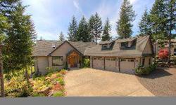 Premier Lakeland Village residence on the 5th Fairway. Architecturally designed featuring the finest materials available and meticulous attention to detail. Gorgeous St. Helens fir floors, Sierra Pacific windows, soapstone & fir counters, Viking and