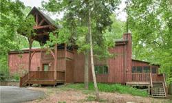 GREEN GETAWAY EXTRAVAGANZA! This luxurious pool party chalet nestled in the trees has 28 acres of privacy to hike or hunt. It's built with local materials using a sophisticated Passive Solar Designhttp