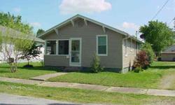 This is a "must see" doll house perfect for the couple wanting to downsize. It's in move in condition with all new siding, new roof & insulation, new windows and wiring and you will love the new screened-in front porch. It also features an above ground