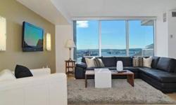One Pacific Tower is one of Seattles most beautiful condominiums sitting on 1st Avenue near the Pike Place Market. It is situated at an angle to maximize its views of the glistening Puget Sound and Mt. Rainier. The doorman will greet you when you arrive