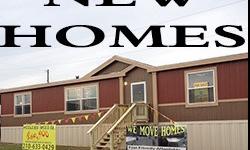 Beautiful Double wide from Champion Homes.Save THOUSANDS on this!It features an amazing open floor plan that makes you feel it is much bigger on the inside!With a large wrap around breakfast bar, wide kitchen and tons of cabinet space this kitchen is one