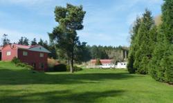 Property includes an extra-large hay barn, barn with stalls, covered arena and outdoor arena. There is a platform for new construction of another out buildtng, completely ready with electrtcal and water to site. There are 2 large ponds and one winter pond