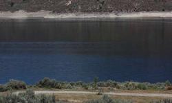 Breathtaking Lake Roosevelt Acreage with spectacular views and great building sites. Easy access from Highway. Water, power, and phone at property line. Great home sites or recreational getaways. Sunny Hills Common Lot allows family and friends great