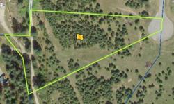 Beautiful land just above the Spokane River! With over two acres of land, a private well, built in electricity and telephone access, and located in a gated subdivision this piece of land is bound to sell fast!