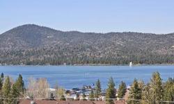 Spectacular Views of Big Bear Lake! Panoramic Lake view from almost every room in the house. Walk to the village. Slopes close by. Bunk room sleeps 10. Multiple decks for entertaining. Master Suite on its' own level. Two living rooms....one for the adults