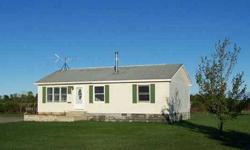 Are you looking for a country setting but not to far from the city and other adjoining towns? Here is a two bedroom one bath modular ranch style home with a 24x36 hip roof 2 story barn style garage. The home is heated with a kerosene monitor and a wood