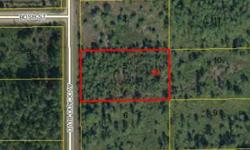 Nice lot located on paved Rd. in a nice area of the Dayton North Subdivision. Close to a large lake, new home next door, all improvements including