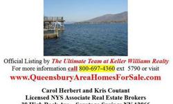 Sprawling family compound directly on the lake. Stunning views of Harris Bay at this great Assembly Point location. Big house has 2 complete kitchens, HUGE dining area, great stone fireplace, several cozy family rooms w/ lake views. Property also has 2